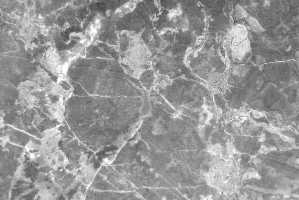 İnce beyaz damarlama ile çekilen koyu gri mermer doku