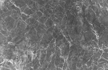 İnce beyaz damarlama ile çekilen koyu gri mermer doku