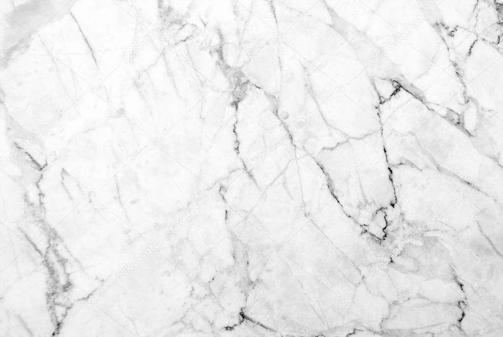 White marble texture with lots of bold contrasting veining 