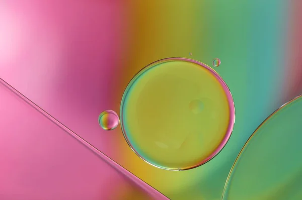 Oil drops on a water surface - abstract rainbow colored macro (595) — Stock Photo, Image