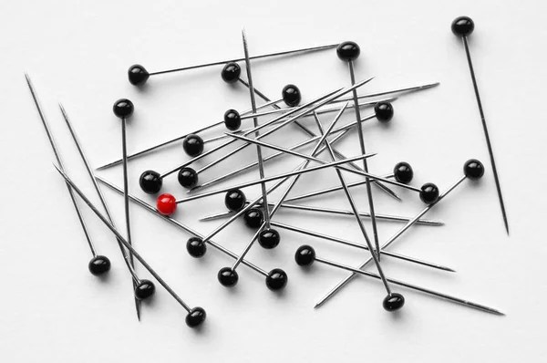 Bunch of pins - one red pinhead — Stock Photo, Image