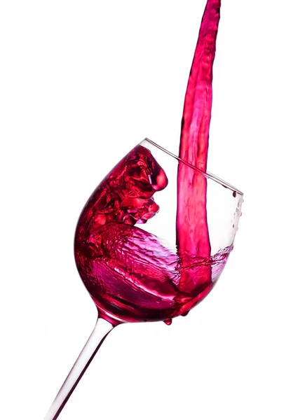 Glas mit spritzender Flüssigkeit — Stockfoto
