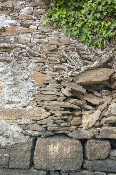 Nedsliten vägg detalj — Stockfoto