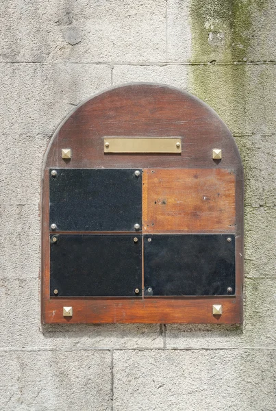 Old wooden doorplate seen in Brittany, France — Stock Photo, Image