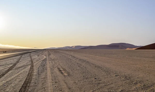 Dirt road in Namibia at evening time — Stock Photo, Image