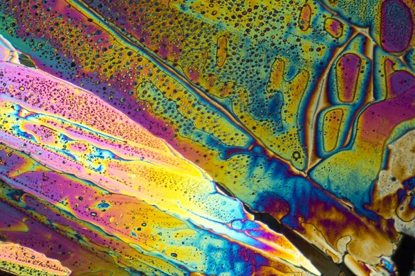 Красочные микрокристаллы ацетата натрия — стоковое фото