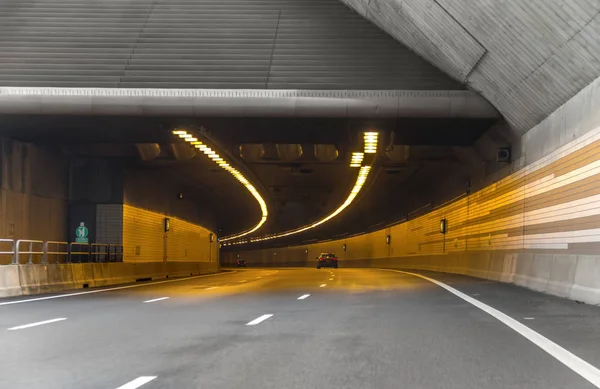 illuminated highway tunnel