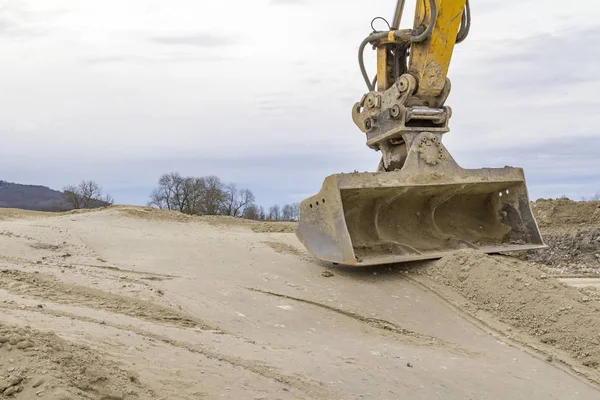 Excavadora pala y sitio de construcción — Foto de Stock