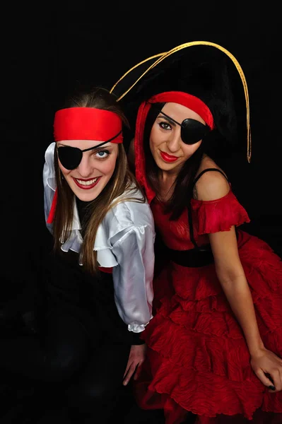 Dívky nosí piráti karneval kostým a čepice Stock Snímky