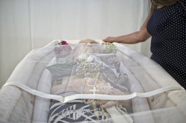 elderly woman died in the coffin clipart