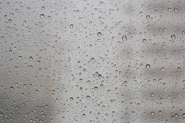 雨滴从玻璃上滑落的纹理 — 图库照片