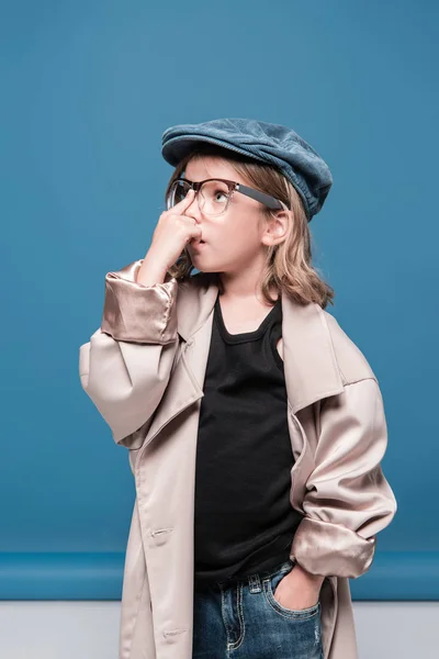 Adorable little girl in cap — Stock Photo, Image