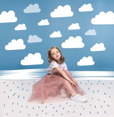 Adorable girl in pink skirt clipart