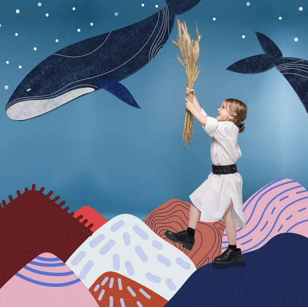 Дівчина з пшеничними вухами і китами — стокове фото