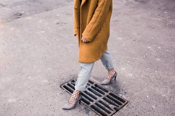 woman walking on street