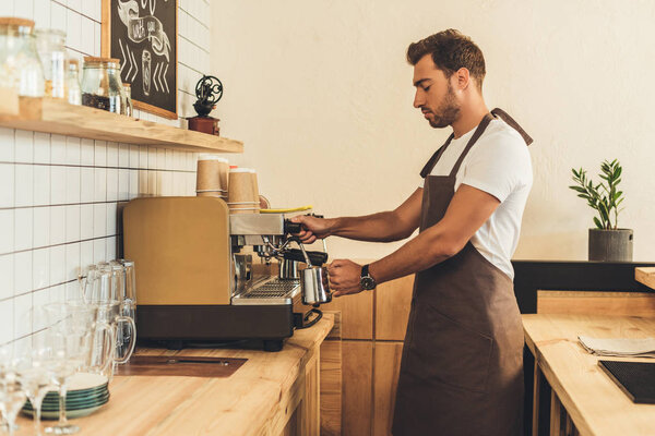 barista making coffee