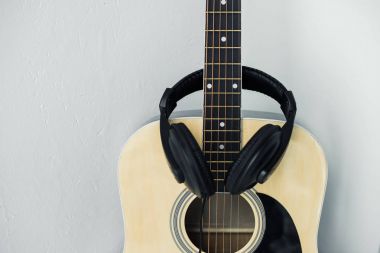 acoustic guitar and headphones clipart