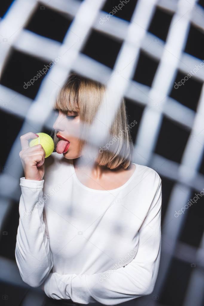 beautiful woman with tennis ball