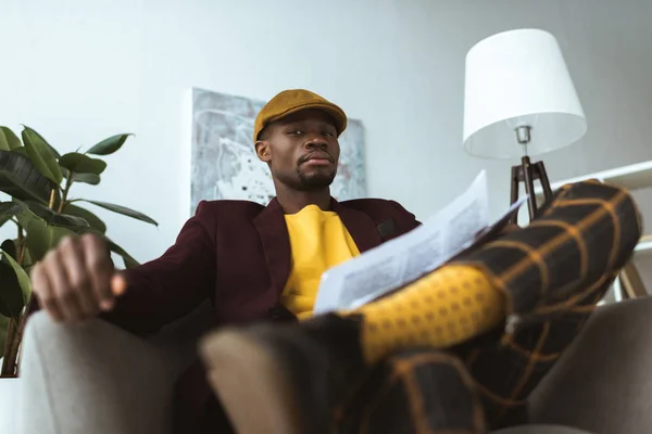 African american businessman with newspaper — Stock Photo, Image