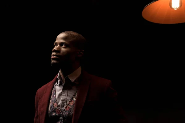 African american man with lamp — Stock Photo, Image