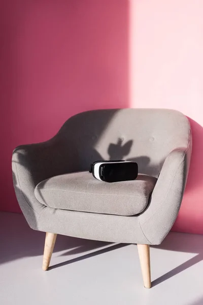 Virtual reality headset on armchair — Stock Photo, Image