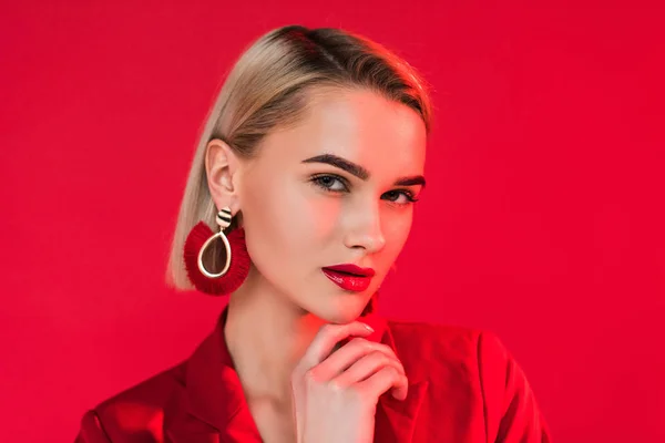 Attractive fashionable girl in earrings — Stock Photo, Image