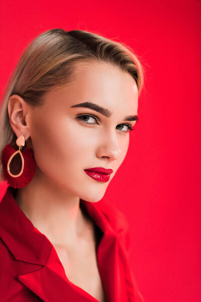 stylish girl posing in earrings