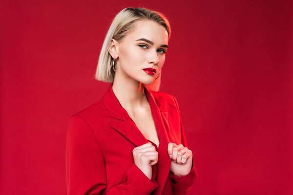 elegant girl posing in red jacket