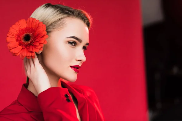 Elegant girl with red flower — Stock Photo, Image