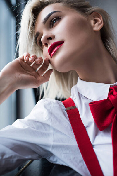 blonde girl with red lipstick 