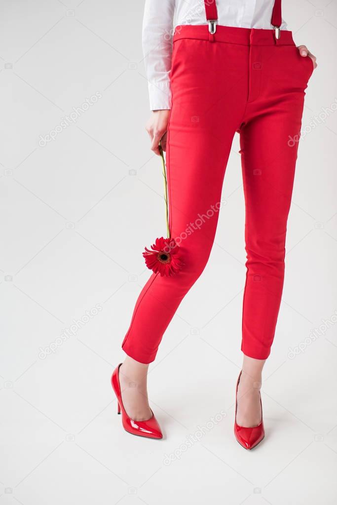 stylish girl in red pants 