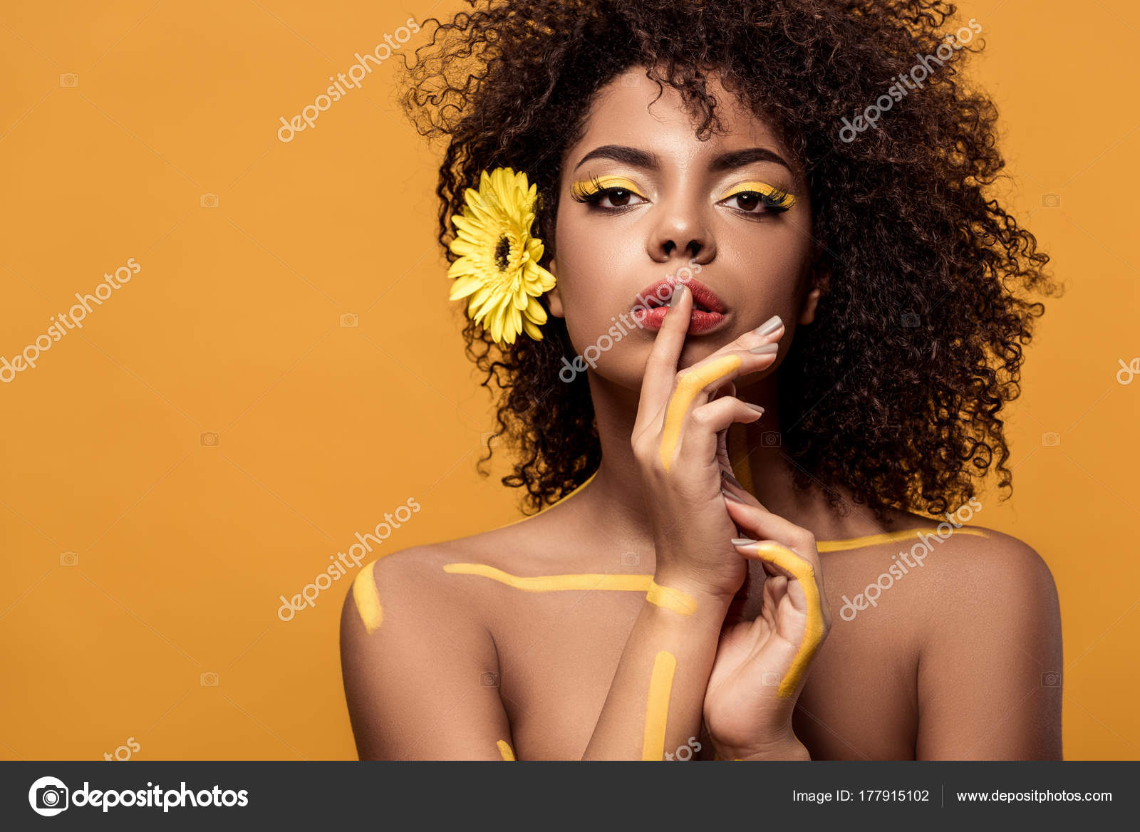 Young Sensual African American Woman Artistic Make Gerbera Hair Holding  Stock Photo by ©Y-Boychenko 177915102