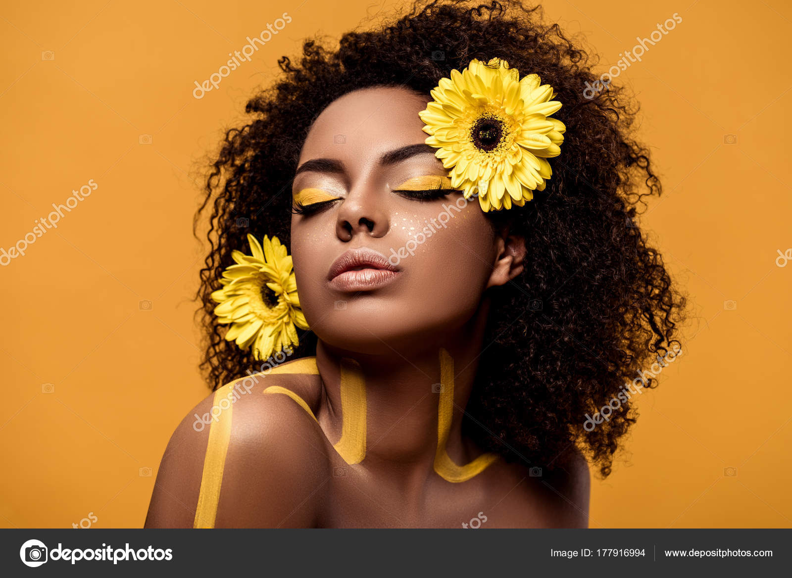 Young Sensual African American Woman Artistic Make Gerbera Hair Isolated  Stock Photo by ©Y-Boychenko 177916994