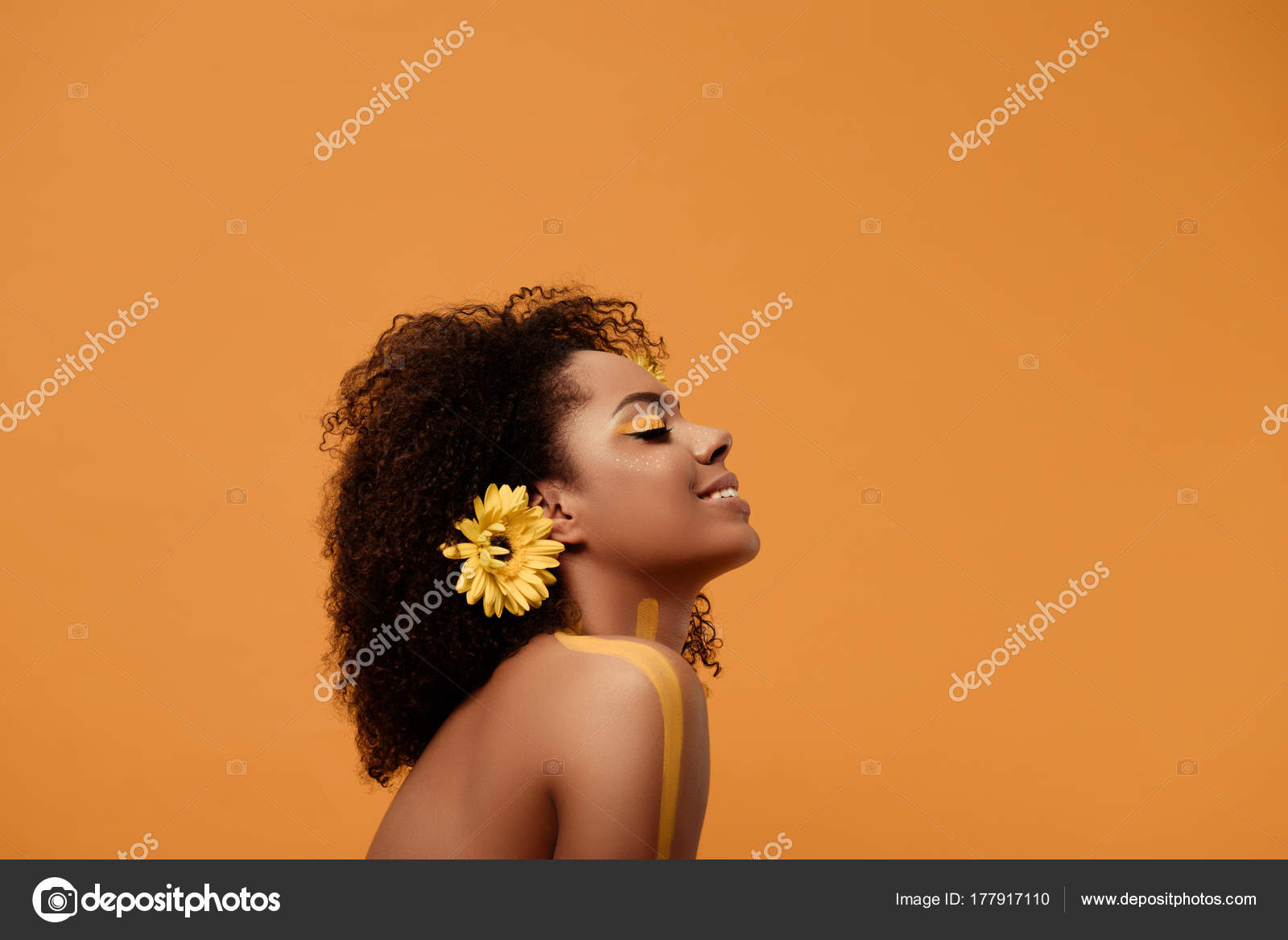 Stylish African American Woman Artistic Make Gerbera Hair Isolated Orange  Stock Photo by ©Y-Boychenko 177917110