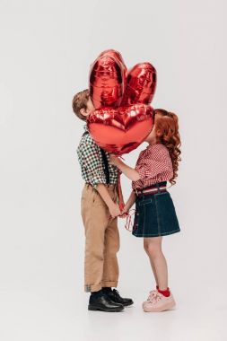 yan görünümü güzel küçük çift duran kalbi olan gri izole balon şeklinde 