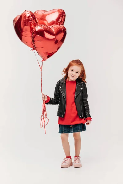 Adorabile Bambina Con Palloncini Forma Cuore Isolato Grigio — Foto Stock