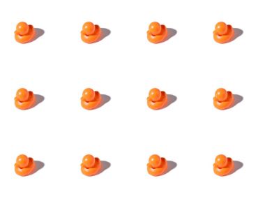 background with small orange rubber ducks on white clipart