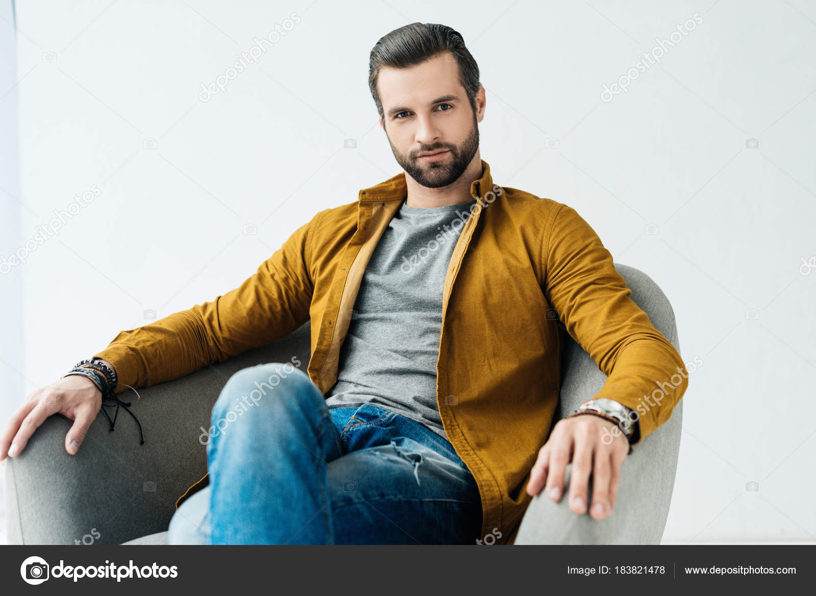 sitting in armchair