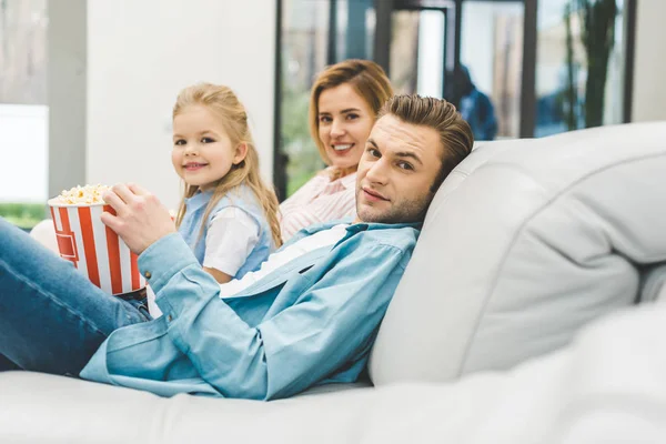 Side View Family Popcorn Looking Camera While Watching Film Together — Stock Photo, Image