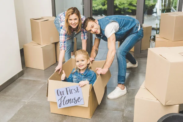 Smiling Parents Playing Little Daughter Our First House Board Cardboard — Stock Photo, Image