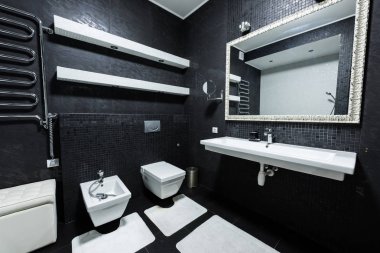 modern banyo beyaz ve siyah renklerde görünümünü