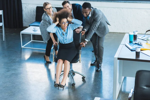 Multicultural Businesspeople Having Fun Racing Colleague Chair Office — Stock Photo, Image