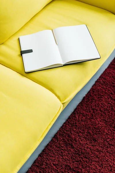 Empty Textbook Pages Pencil Yellow Couch — Free Stock Photo