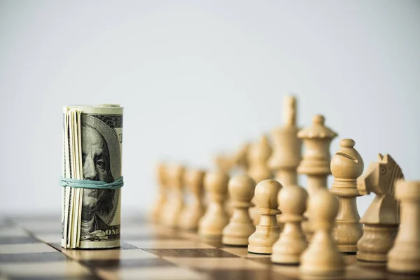 Chess Pieces Rolled Cash Chess Board Isolated White — Stock Photo, Image