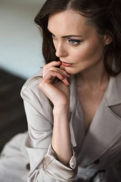 fashionable woman in classic trench coat