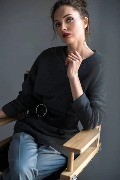 Portrait Beautiful Tender Woman Sitting Chair Looking Camera Grey — Stock Photo, Image