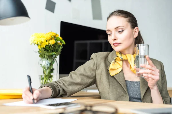 Beautiful Stylish Businesswoman Holding Glass Water Taking Notes Workplace — Stock Photo, Image