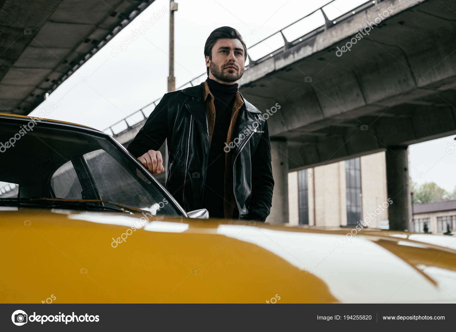 Handsome Stylish Young Man Leather Jacket Standing Yellow Classic Handsome Stylish Young Man Leather Jacket Standing Yellow Classic Car Stock Photo