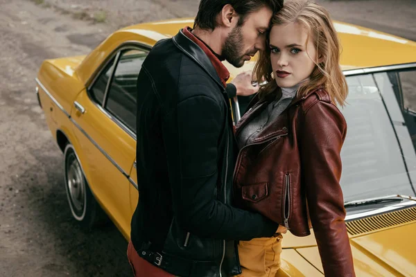 High Angle View Beautiful Stylish Young Couple Hugging Yellow Car — Stock Photo, Image