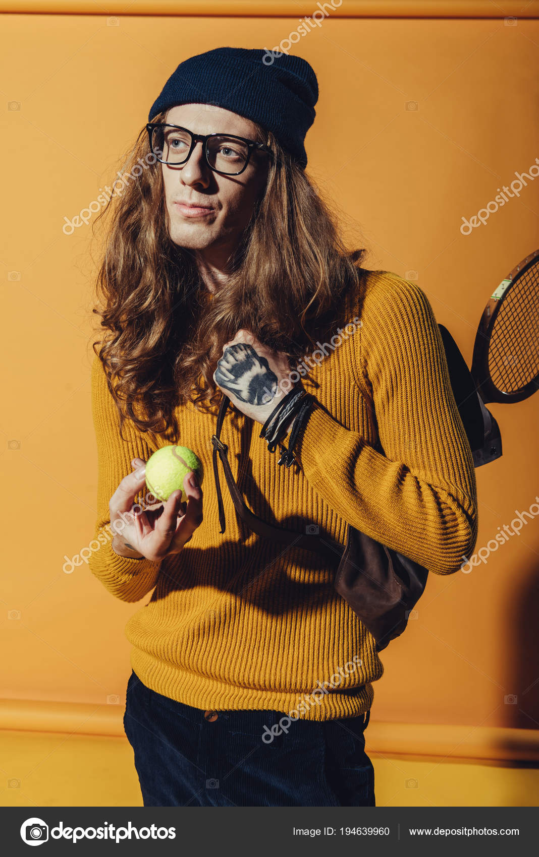 Stylish Man Long Hair Holding Tennis Ball Yellow Stock